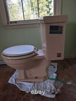 Retro 1950s round pink toilet. Local pickup only